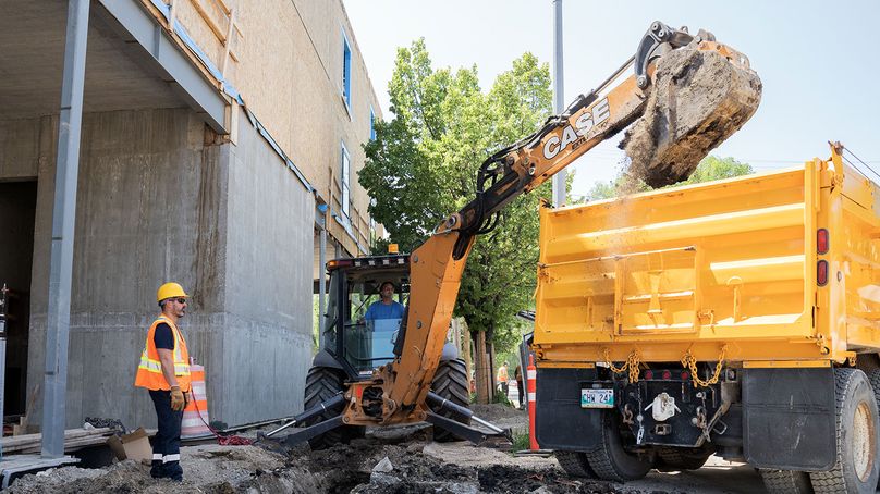 Manitoba Hydro employees do excavation work at Osborne Terraces project.